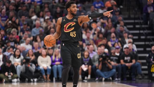 Nov 13, 2023; Sacramento, California, USA; Cleveland Cavaliers guard Donovan Mitchell (45) dribbles the ball against the Sacramento Kings in the second quarter at the Golden 1 Center. Mandatory Credit: Cary Edmondson-USA TODAY Sports